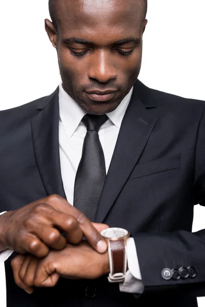 African man in formalwear checking time — Stock Photo, Image