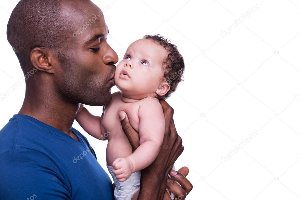 African man holding his little baby