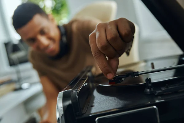 Close Cheerful Young African Man Turning Turntable — Stock Photo, Image