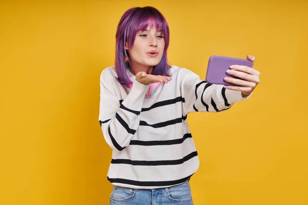 Cheerful Young Woman Blowing Kiss While Making Selfie Yellow Background — 스톡 사진