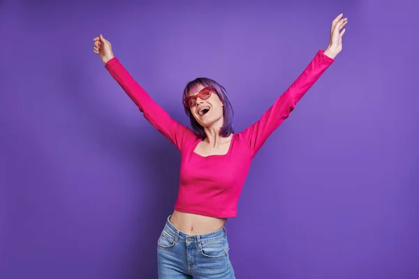 Happy Young Woman Stretching Out Hands While Standing Purple Background — 스톡 사진