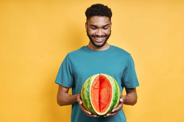 Happy African Man Holding Watermelon While Standing Yellow Background —  Fotos de Stock