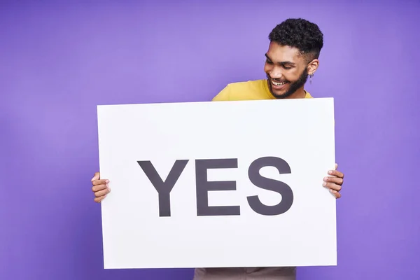 Handsome African Man Holding Banner Looking Smile Purple Background — 스톡 사진