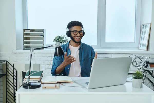 Happy Young African Man Having Web Conference Gesturing While Working — Stock Photo, Image