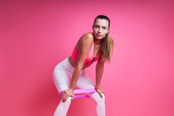Beautiful Young Woman Exercising Elastic Band Pink Background — Photo