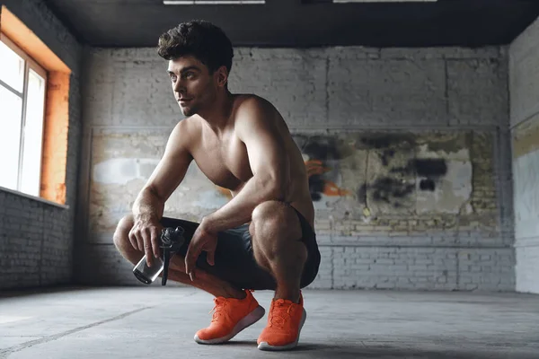 Handsome Muscular Man Holding Bottle Water While Relaxing Training Gym — Foto de Stock