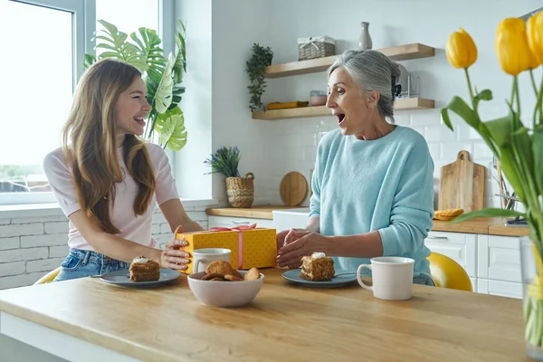 Happy Senior Mother Receiving Gift Box Her Adult Daughter While — Foto de Stock