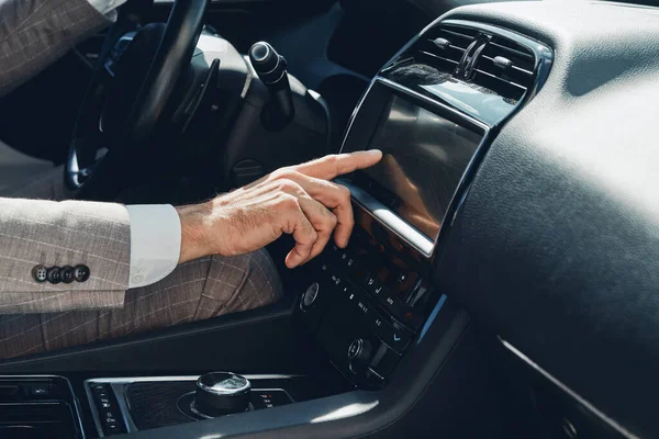 Close Man Using Control Panel While Sitting Front Seat Car — Foto Stock