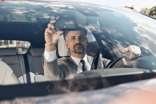 Confident Man Formalwear Adjusting Rear View Mirror While Sitting Front — Foto Stock