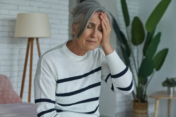 Depressed Woman Touching Head While Sitting Bed Home — Stock Fotó