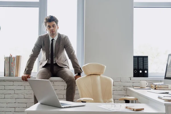 Handsome Young Man Formalwear Sitting Window Sill Office — Stock Photo, Image