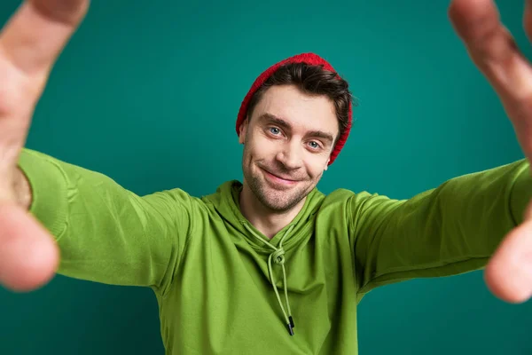 Handsome Young Man Looking Finger Frame While Standing Green Background — Foto Stock