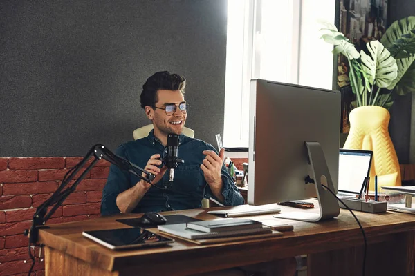 Handsome Young Man Using Microphone Gesturing While Recording Podcast Studio — Fotografia de Stock