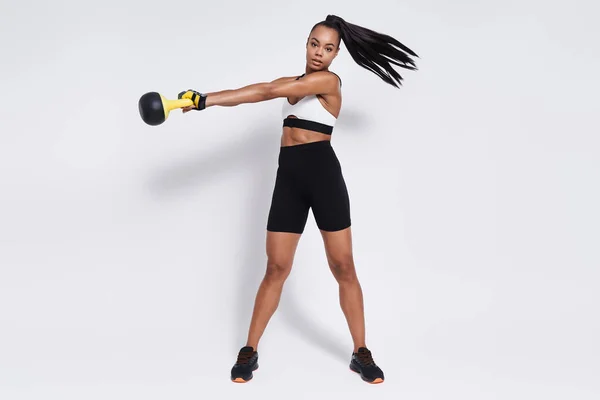 Beautiful Young African Woman Exercising Kettlebell White Background — Foto de Stock