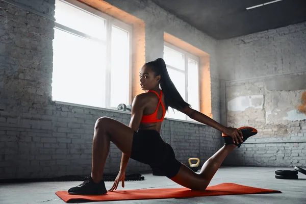 Beautiful Young African Woman Doing Stretching Exercises Gym —  Fotos de Stock