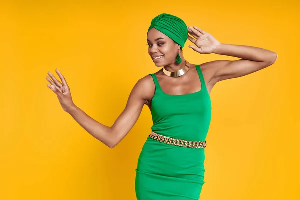 Beautiful African Woman Traditional Headwear Dancing Yellow Background — Stock Photo, Image