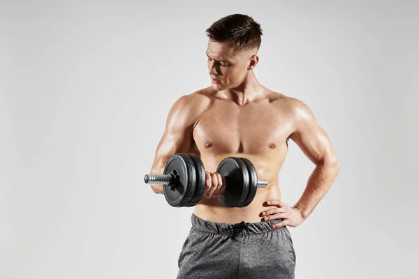 Confident Young Man Perfect Body Exercising Dumbbell White Background — Stock Photo, Image