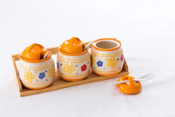 Ceramic pots on a shelf — Stock Photo, Image