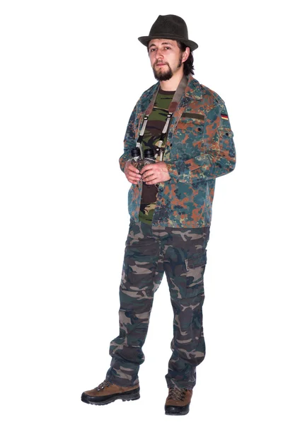 Hunter holding binocular in his hands — Stock Photo, Image