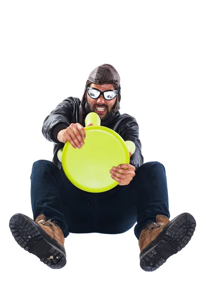 Concentrated man is driving an imaginary car — Stock Photo, Image