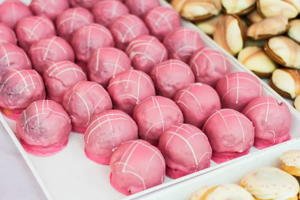 Pink cookies placed in a plateau — Stock Photo, Image