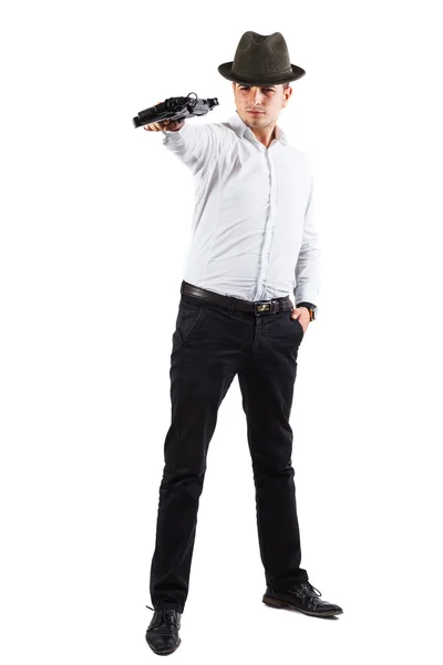 Delighted assasin with gun — Stock Photo, Image