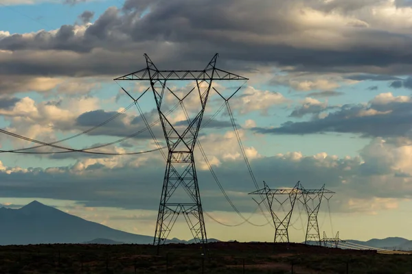 Power Supply Line Composed Many Pylons Transposed Line Mountains Cloudy — Stock Photo, Image