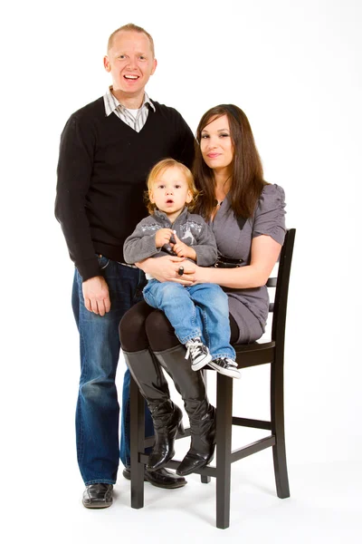 Familj på tre i studio — Stockfoto