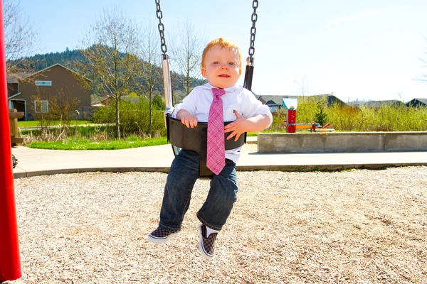 One Year Old Swinging — Stockfoto