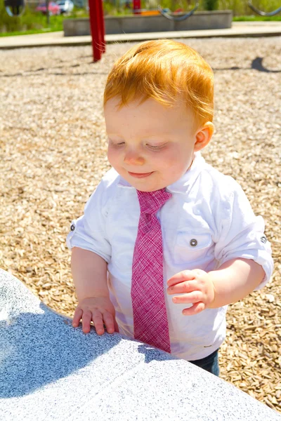 Menino no parque infantil — Fotografia de Stock