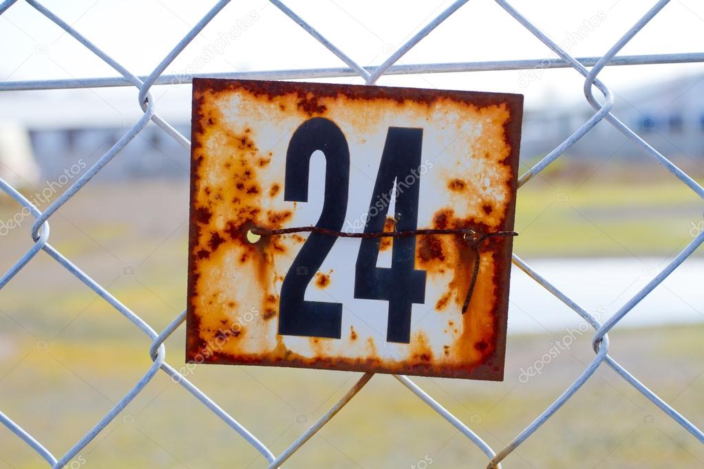 Number 24 Rusted Sign