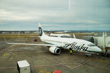 Alaska Airlines Flight Boarding clipart