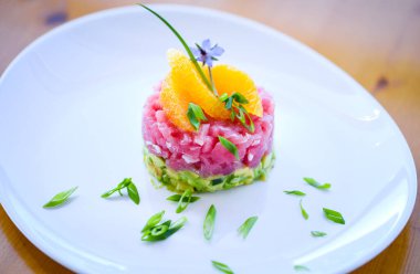 delicious tuna tartar with fresh avocado and orange