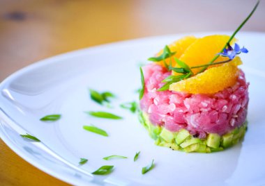 delicious tuna tartar with fresh avocado and orange