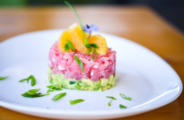 delicious tuna tartar with fresh avocado and orange