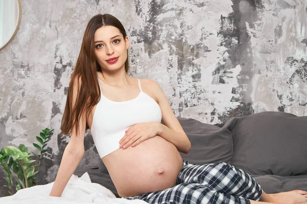 Attractive Cute Young Pregnant Woman Striped Pants White Top Sitting — Stock Photo, Image