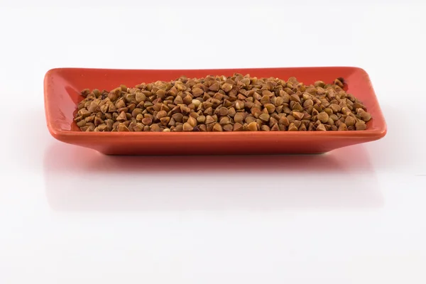 Buckwheat on a terracotta plate