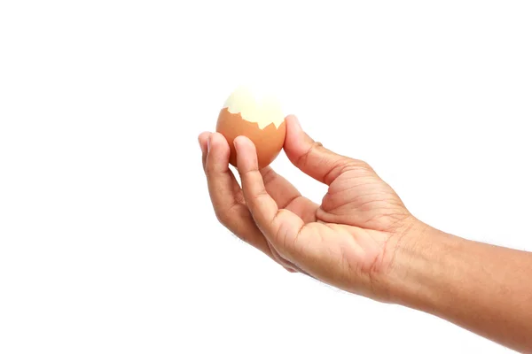 Mãos masculinas trazem ovo isolado no fundo branco — Fotografia de Stock
