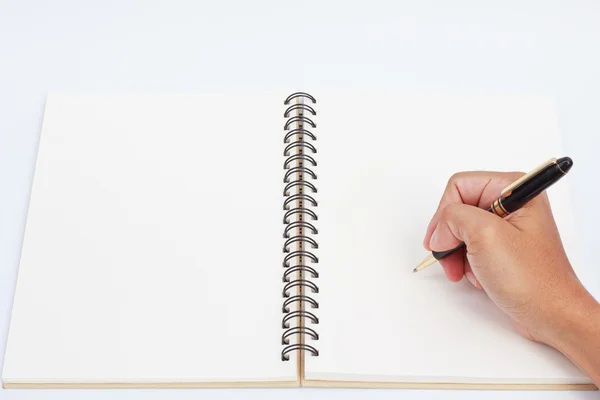 Hand drawing in blank notebook . — Stock Photo, Image