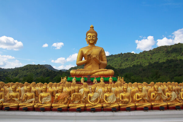 Many buddha statue under blue sky in temple, Nakornnayok , Thail