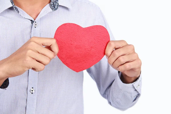 Rapporti e concetto d'amore - primo piano dell'uomo mani con il cuore — Foto Stock