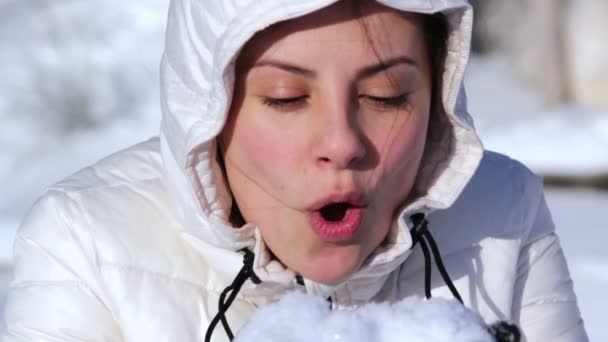 Young girl playing with snow — Stock Video