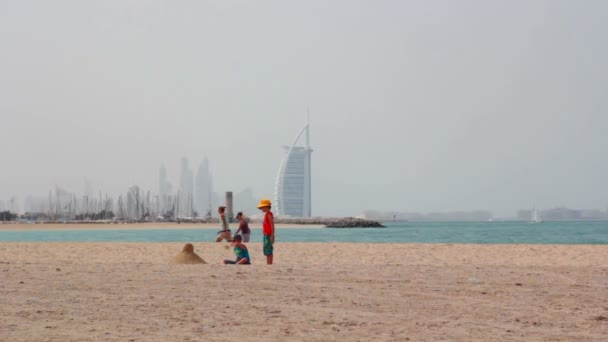 Dubai.UAE.Burj Al Arab in February 2014.Jumeirah beach promenade.Dubai Offshore SailingClub. — Stock Video
