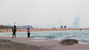 Dubai.UAE.Burj al Şubat 2014.jumeirah beach promenade.dubai offshore sailingclub, arab.