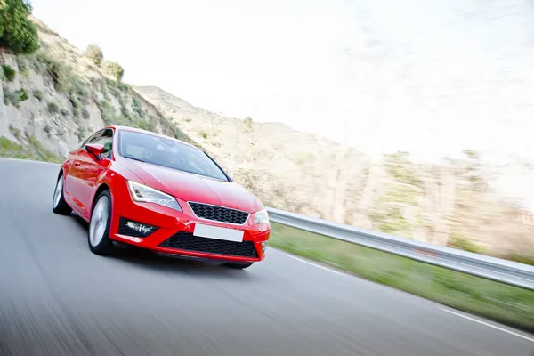 Car on a road full of dangerous bends — Stock Photo, Image