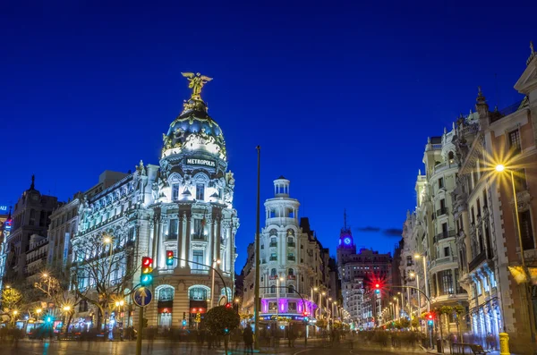 Rays of traffic lights on Gran via street