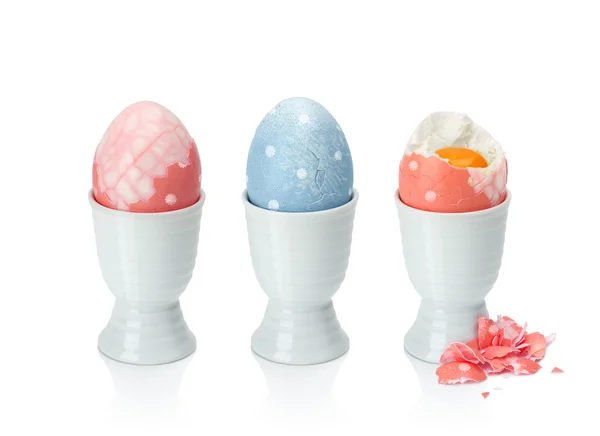 Colorful easter eggs in egg cup — Stock Photo, Image