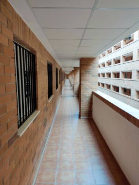 Modern urbam architecture from red bricks. Building construction in perspective view.