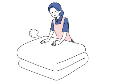 Bir kadının şilte katlama sanatı