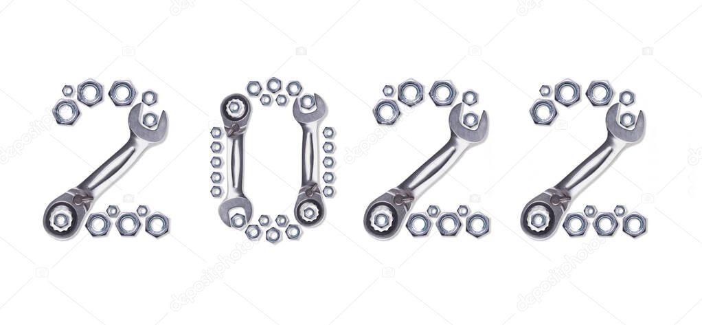 Pattern of metal nuts for bolts, numbers 2022 New Year, isolate on a white background. Spare parts for fastenings designs, Christmas card holiday greetings. Ratchet Wrench.